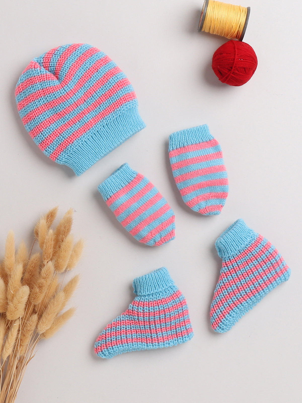 combo of cap mittens and socks with strips pattern for baby