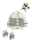Full sleeves front open cream color sweater with matching cap and socks for baby