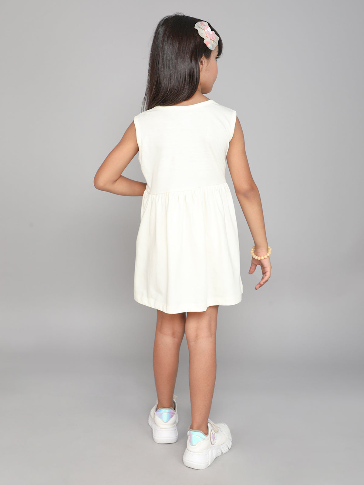 Printed Sleeveless Cream Dress for girls