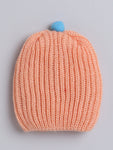 Knitted Peach color round cap for baby