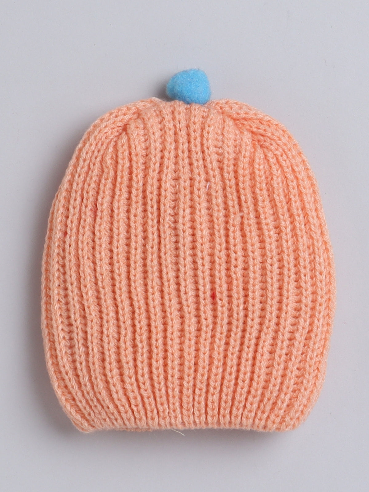 Knited Peach color round cap for baby